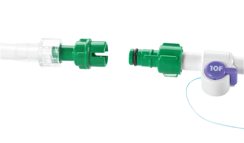 Fastbreak Breakaway Connector - Green connector showing break between catheter & fluid reservoir