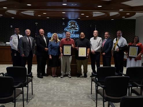 Merit Employees Receive Award for Saving CoWorker's Life