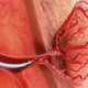 Animation still showing a tumor being treated with embolic agents