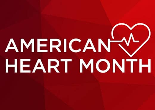 Red background with the words American Heart Month on it in white
